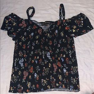 Floral off the shoulder top with straps.